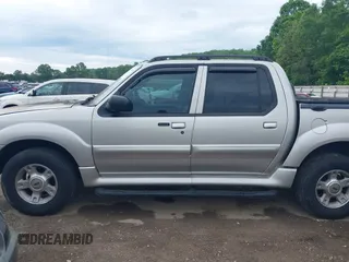 2004 Ford Explorer Sport Trac XLS z VIN 1FMDU77K74UA77223, wystawiony jako IAAI lot #42167996 z przebiegiem Nie podano mil oraz . Historia ofert i sprzedaży dostępna na DreamBid. Obrazek 14.