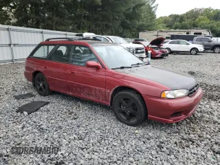 1998 Subaru Legacy L with VIN 4S3BK4350W6308826, listed as a Copart auction lot 71891284 with 134,419 mi miles and Salvage title. Bid and sale history available at DreamBid. Image 4.