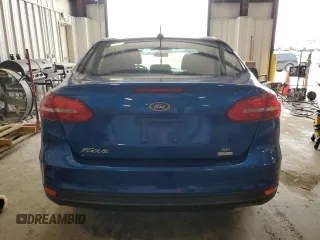 2018 Ford Focus SE z VIN 1FADP3FE2JL332464, wystawiony jako Copart lot #55649215 z przebiegiem 95 541 mil mil oraz Czysty tytuł • Clean title. Historia ofert i sprzedaży dostępna na DreamBid. Obrazek 6.