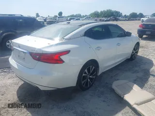 2017 Nissan Maxima SR with VIN 1N4AA6AP7HC453242, listed as a IAAI auction lot 42169056 with 104,881 mi miles and . Bid and sale history available at DreamBid. Image 4.