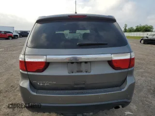 2012 Dodge Durango SXT with VIN 1C4RDHAG9CC335430, listed as a Copart auction lot 55495995 with 210,063 mi miles and Salvage title. Bid and sale history available at DreamBid. Image 6.
