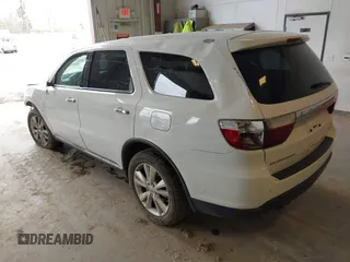 2013 Dodge Durango Crew z VIN 1C4SDJDT3DC540700, wystawiony jako IAAI lot #42097270 z przebiegiem 197 195 mil mil oraz . Historia ofert i sprzedaży dostępna na DreamBid. Obrazek 3.