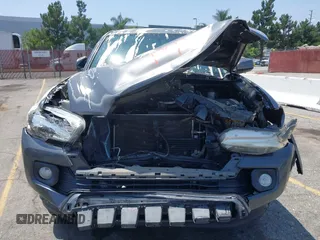 2017 Toyota Tacoma SR5 z VIN 3TMAZ5CN0HM039730, wystawiony jako IAAI lot #42406448 z przebiegiem 69 530 mil mil oraz . Historia ofert i sprzedaży dostępna na DreamBid. Obrazek 6.