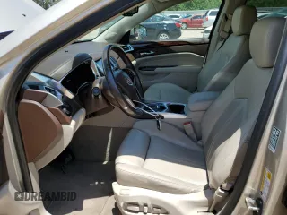 2015 Cadillac SRX Luxury Collection z VIN 3GYFNBE31FS637758, wystawiony jako Copart lot #56911815 z przebiegiem 73 893 mil mil oraz Czysty tytuł • Clean title. Historia ofert i sprzedaży dostępna na DreamBid. Obrazek 7.