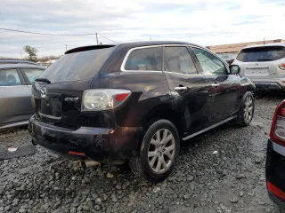 2007 Mazda CX-7 Sport with VIN JM3ER29L570120611, listed as a Copart auction lot 86691444 with 128,486 mi miles and Salvage Title. Bid and sale history available at carsss.com. Image 3.