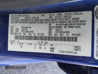 2014 Ford Fiesta SE with VIN 3FADP4BJ5EM190009, listed as a IAAI auction lot 42036976 with 157,575 mi miles. Bid and sale history available at carsss.com. Image 9.