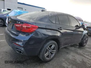 2016 BMW X6 sDrive35i with VIN 5UXKU0C54G0F93393, listed as a Copart auction lot 39393874 with 103,254 mi miles. Bid and sale history available at carsss.com. Image 3.
