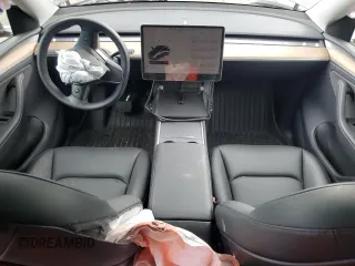 2024 Tesla Model Y Long Range с VIN 7SAYGDEE7RA271520, выставлен на аукционе Copart как лот 56526025 с пробегом 28 745 миль миль и Списание • Salvage title. История ставок и продаж доступна на DreamBid. Изображение 8.