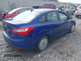 2012 Ford Focus SE with VIN 1FAHP3F2XCL266692, listed as a IAAI auction lot 42130412 with 114,608 mi miles and . Bid and sale history available at carsss.com. Image 4.
