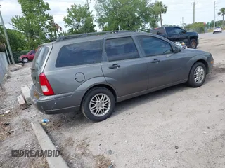 2005 Ford Focus SE with VIN 1FAFP36N35W211505, listed as a IAAI auction lot 42087016 with 256,413 mi miles and . Bid and sale history available at carsss.com. Image 4.