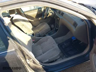 2001 Toyota Camry CE with VIN JT2BG22K210598164, listed as a IAAI auction lot 41457913 with 129,198 mi miles. Bid and sale history available at carsss.com. Image 5.