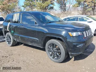 2018 Jeep Grand Cherokee Laredo E with VIN 1C4RJFAG8JC453706, listed as a IAAI auction lot 41688655 with 116,965 mi miles. Bid and sale history available at carsss.com. Image 1.