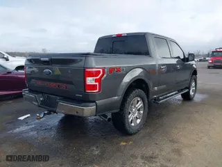 2019 Ford F-150 XL with VIN 1FTEW1E41KKF22472, listed as a IAAI auction lot 41493985 with 113,736 mi miles. Bid and sale history available at carsss.com. Image 4.