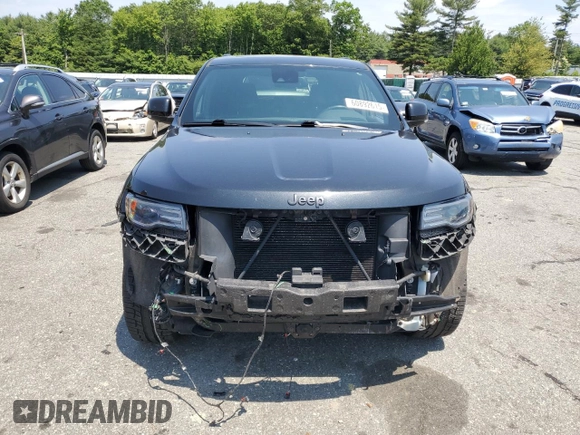 2016 Jeep Grand Cherokee Overland z VIN 1C4RJFCG5GC343864, wystawiony jako Copart lot #60892615 z przebiegiem 97 133 mil mil oraz Szkoda całkowita • Salvage title. Historia ofert i sprzedaży dostępna na DreamBid. Obrazek 5.