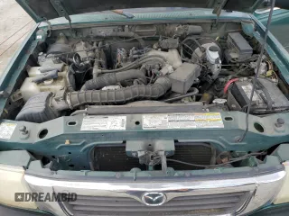 1999 Mazda B-Series 2WD Truck SE with VIN 4F4YR16VXXTM26442, listed as a Copart auction lot 54518674 with 184,041 mi miles and Salvage Title. Bid and sale history available at carsss.com. Image 11.