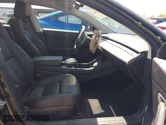 2018 Tesla Model 3 Long Range Battery with VIN 5YJ3E1EA7JF098632, listed as a IAAI auction lot 42002181 with 73,371 mi miles and . Bid and sale history available at DreamBid. Image 5.