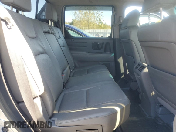2012 Honda Ridgeline RTL with VIN 5FPYK1F55CB452206, listed as a Copart auction lot 74694204 with 128,226 mi miles and Clean Title. Bid and sale history available at carsss.com. Image 10.