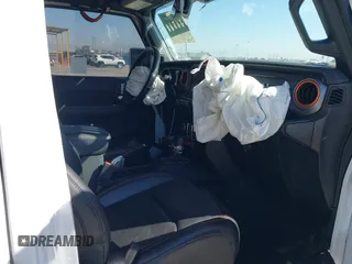 2022 Jeep Gladiator Mojave z VIN 1C6JJTEG0NL103523, wystawiony jako IAAI lot #41842011 z przebiegiem 36 160 mil mil oraz . Historia ofert i sprzedaży dostępna na DreamBid. Obrazek 5.