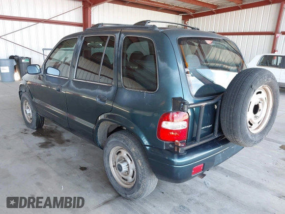2000 Kia Sportage with VIN KNDJB7232Y5651398, listed as a IAAI auction lot 41678617 with 156,144 mi miles. Bid and sale history available at carsss.com. Image 3.