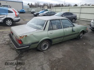 1981 Mazda 626 z VIN JM1GB2216B0531636, wystawiony jako Copart lot #85505404 z przebiegiem 41 816 mil mil oraz Szkoda całkowita • Salvage title. Historia ofert i sprzedaży dostępna na DreamBid. Obrazek 3.