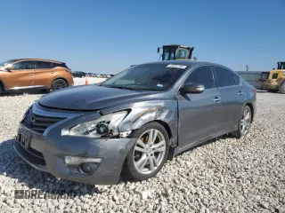 2015 Nissan Altima SL z VIN 1N4BL3AP2FC450338, wystawiony jako Copart lot #45697765 z przebiegiem 182 091 mil mil oraz Szkoda całkowita • Salvage title. Historia ofert i sprzedaży dostępna na DreamBid. Obrazek 1.