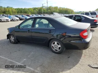2002 Toyota Camry XLE z VIN 4T1BF32K02U034535, wystawiony jako Copart lot #53894995 z przebiegiem 253 037 mil mil oraz Szkoda całkowita • Salvage title. Historia ofert i sprzedaży dostępna na DreamBid. Obrazek 2.