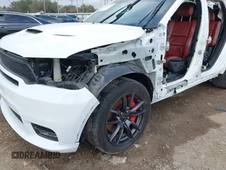 2018 Dodge Durango SRT with VIN 1C4SDJGJ4JC341550, listed as a IAAI auction lot 41525295 with 86,503 mi miles and . Bid and sale history available at DreamBid. Image 18.