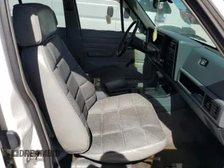 1994 Jeep Cherokee SE with VIN 1J4FT28SXRL151422, listed as a Copart auction lot 77358594 with 74,628 mi miles and Salvage Title. Bid and sale history available at carsss.com. Image 7.