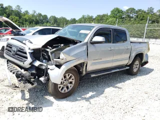 2018 Toyota Tacoma SR5 z VIN 3TMAZ5CN7JM063349, wystawiony jako Copart lot #61767645 z przebiegiem 117 358 mil mil oraz Czysty tytuł • Clean title. Historia ofert i sprzedaży dostępna na DreamBid. Obrazek 1.