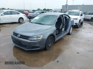 2013 Volkswagen Jetta SE with VIN 3VWDX7AJ9DM371414, listed as a IAAI auction lot 41861196 with 156,169 mi miles and . Bid and sale history available at DreamBid. Image 2.