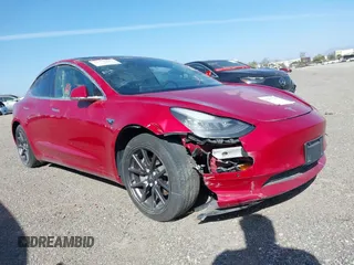2020 Tesla Model 3 Standard Range Plus with VIN 5YJ3E1EA7LF706636, listed as a IAAI auction lot 32371217 with 35,389 mi miles. Bid and sale history available at carsss.com. Image 1.