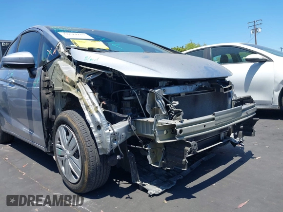 2019 Honda Fit LX z VIN 3HGGK5H42KM733455, wystawiony jako IAAI lot #42644157 z przebiegiem 51 036 mil mil oraz . Historia ofert i sprzedaży dostępna na DreamBid. Obrazek 6.