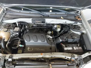 2004 Mazda Tribute ES with VIN 4F2CZ96104KM03252, listed as a IAAI auction lot 41153343 with 204,621 mi miles and . Bid and sale history available at carsss.com. Image 10.