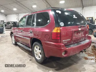2006 GMC Envoy SLT with VIN 1GKDS13S362135683, listed as a IAAI auction lot 41477501 with 214,760 mi miles. Bid and sale history available at carsss.com. Image 3.