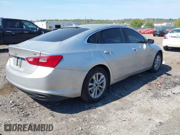 2018 Chevrolet Malibu LT with VIN 1G1ZD5ST0JF128973, listed as a IAAI auction lot 42107240 with 101,107 mi miles and . Bid and sale history available at carsss.com. Image 4.