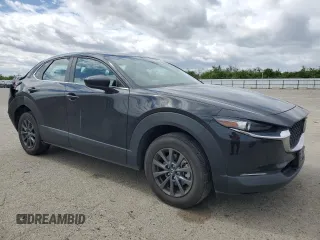 2023 Mazda CX-30 S with VIN 3MVDMBAM7PM555455, listed as a Copart auction lot 51268345 with 34,552 mi miles and Salvage Title. Bid and sale history available at carsss.com. Image 4.