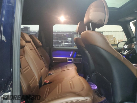 2020 Mercedes-Benz G 550 z VIN W1NYC6BJ8LX345414, wystawiony jako Copart lot #50952435 z przebiegiem 14 261 mil mil oraz Szkody całkowita. Historia ofert i sprzedaży dostępna na DreamBid. Obrazek 11.