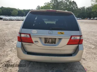 2006 Honda Odyssey EX-L with VIN 5FNRL38706B037805, listed as a Copart auction lot 57390365 with 219,554 mi miles and Salvage title. Bid and sale history available at DreamBid. Image 6.
