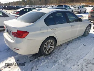 2016 BMW 3 Series 320i xDrive z VIN WBA8E5G59GNT93445, wystawiony jako IAAI lot #41515452 z przebiegiem 96 437 mil mil oraz . Historia ofert i sprzedaży dostępna na DreamBid. Obrazek 4.