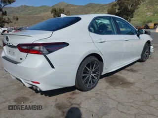 2023 Toyota Camry SE with VIN 4T1T11AK8PU138805, listed as a IAAI auction lot 41977827 with 19,661 mi miles and . Bid and sale history available at DreamBid. Image 4.