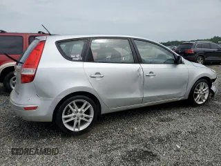2009 Hyundai Elantra Touring z VIN KMHDC86E29U038194, wystawiony jako Copart lot #57483375 z przebiegiem 218 337 mil mil oraz Szkoda całkowita • Salvage title. Historia ofert i sprzedaży dostępna na DreamBid. Obrazek 3.
