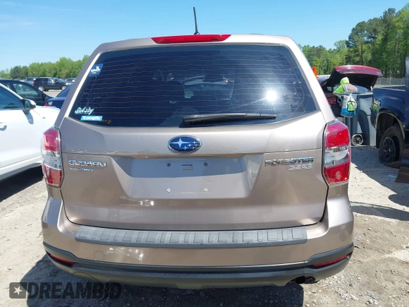 2014 Subaru Forester 2.5i with VIN JF2SJAAC4EH516103, listed as a IAAI auction lot 42065064 with 140,531 mi miles and . Bid and sale history available at DreamBid. Image 16.