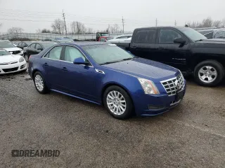 2013 Cadillac CTS Luxury with VIN 1G6DE5E54D0105721, listed as a Copart auction lot 37633874 with 71,341 mi miles and Salvage title. Bid and sale history available at DreamBid. Image 4.
