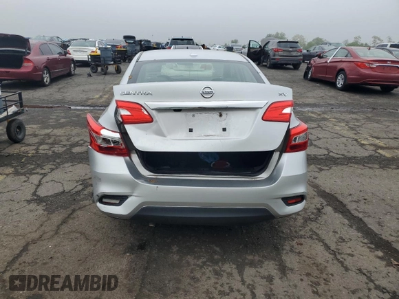 2018 Nissan Sentra SV z VIN 3N1AB7AP9JL661911, wystawiony jako Copart lot #56884985 z przebiegiem 43 129 mil mil oraz Szkoda całkowita • Salvage title. Historia ofert i sprzedaży dostępna na DreamBid. Obrazek 6.