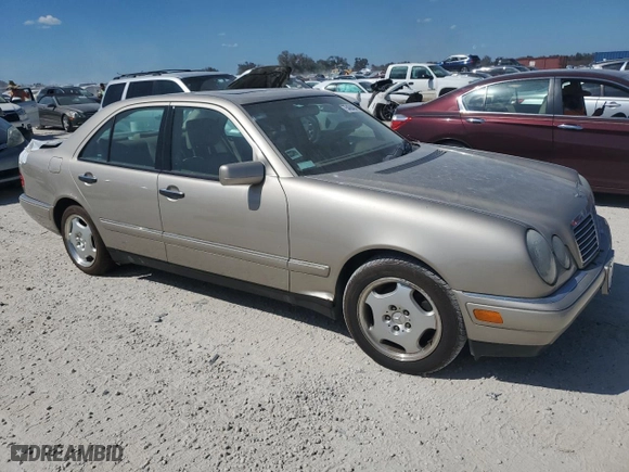 1999 Mercedes-Benz E-Class with VIN WDBJF70H7XA943409, listed as a Copart auction lot 75458484 with 0 mi miles and Salvage Title. Bid and sale history available at carsss.com. Image 4.