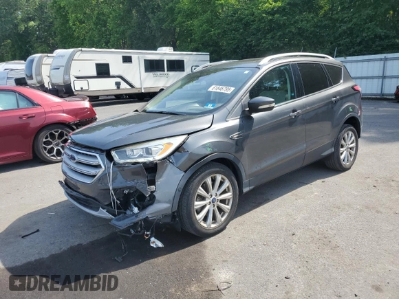 2018 Ford Escape Titanium with VIN 1FMCU9J91JUA47420, listed as a Copart auction lot 61846795 with 77,246 mi miles and Salvage title. Bid and sale history available at DreamBid. Image 1.