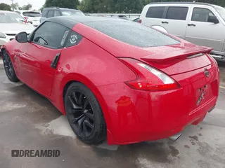 2016 Nissan 370Z z VIN JN1AZ4EHXGM932681, wystawiony jako IAAI lot #42350850 z przebiegiem 94 586 mil mil oraz . Historia ofert i sprzedaży dostępna na DreamBid. Obrazek 3.