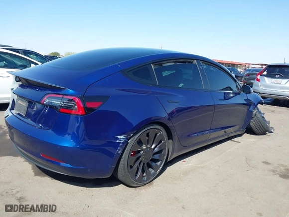 2022 Tesla Model 3 Performance with VIN 5YJ3E1EC4NF347055, listed as a IAAI auction lot 41713504 with 38,266 mi miles. Bid and sale history available at carsss.com. Image 4.