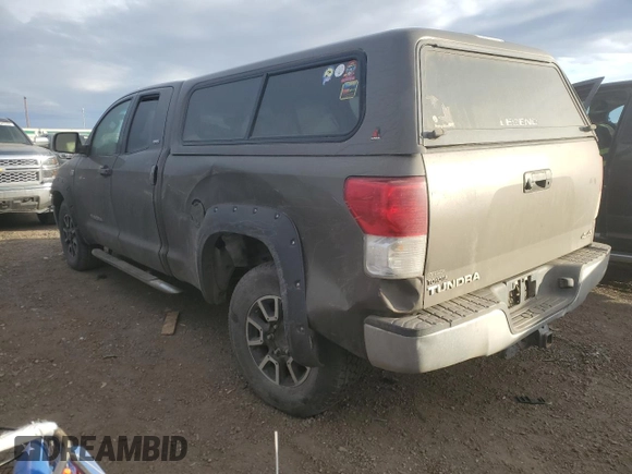 2010 Toyota Tundra 4WD Truck with VIN 5TFUM5F11AX002335, listed as a Copart auction lot 44238765 with 206,525 mi miles and Salvage Title. Bid and sale history available at carsss.com. Image 2.