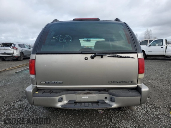 2003 Chevrolet Blazer LS z VIN 1GNDT13X23K120941, wystawiony jako Copart lot #47220845 z przebiegiem 100 245 mil mil oraz Szkoda całkowita • Salvage title. Historia ofert i sprzedaży dostępna na DreamBid. Obrazek 6.